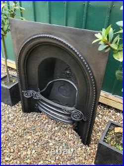 A Lovely Rare Early Victorian Antique Cast Iron Arch Insert Fireplace circa 1850