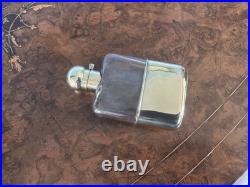A RARE ANTIQUE GILDED GENTLEMAN'S WHISKEY HIP FLASK, EARLY 1900's