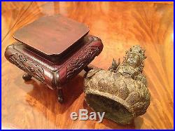 A Rare and Important Early Chinese Bronze Guanyin Statue with Wooden Stand