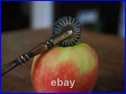 A Super Rare Early Brass Pastry Wheel with Spoon In Good Condition