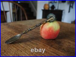 A Super Rare Early Brass Pastry Wheel with Spoon In Good Condition