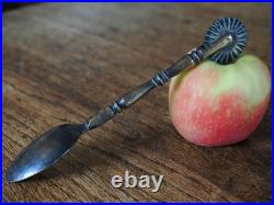 A Super Rare Early Brass Pastry Wheel with Spoon In Good Condition