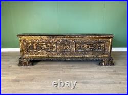 A rare early 17th century walnut gilded Italian Cassone