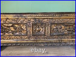 A rare early 17th century walnut gilded Italian Cassone