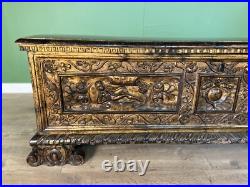 A rare early 17th century walnut gilded Italian Cassone