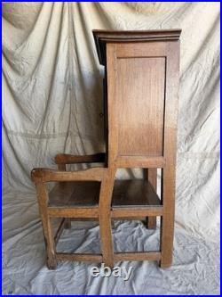 A rare early 19th century antique oak Porter's chair