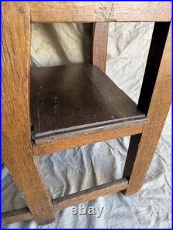 A rare early 19th century antique oak Porter's chair