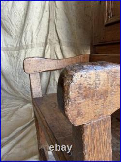 A rare early 19th century antique oak Porter's chair