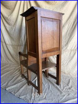 A rare early 19th century antique oak Porter's chair
