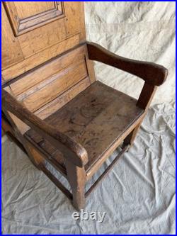 A rare early 19th century antique oak Porter's chair