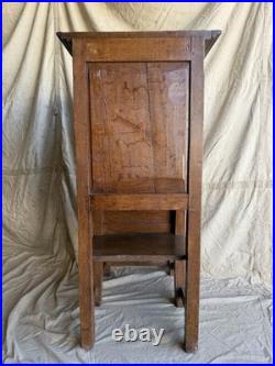 A rare early 19th century antique oak Porter's chair