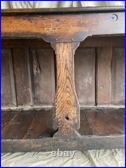 An antique early Georgian North Yorkshire oak dresser base with pot board
