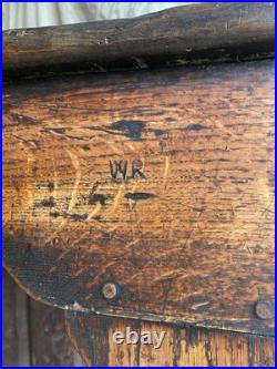 An antique early Georgian North Yorkshire oak dresser base with pot board