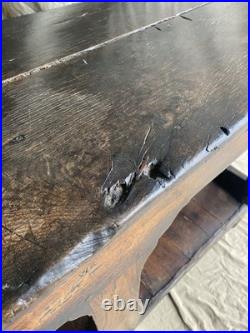 An antique early Georgian North Yorkshire oak dresser base with pot board