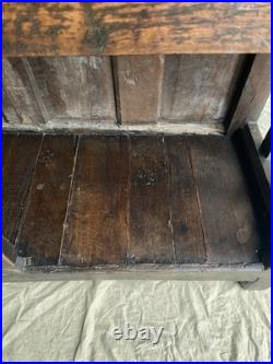 An antique early Georgian North Yorkshire oak dresser base with pot board