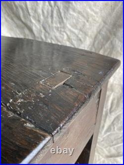 An antique early Georgian North Yorkshire oak dresser base with pot board