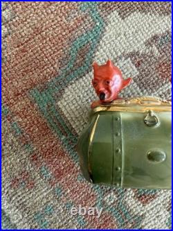 Antique early 1900s German fairing Red Devils in Purse figure, porcelain, RARE