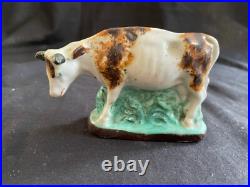 Antique porcelain early cow figurine. Rare and colectors item
