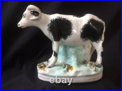 Antique porcelain early cow figurine. Rare and colectors item
