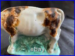 Antique porcelain early cow figurine. Rare and colectors item