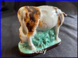 Antique porcelain early cow figurine. Rare and colectors item
