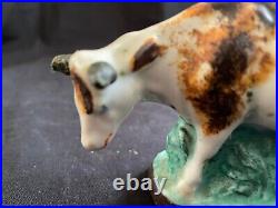 Antique porcelain early cow figurine. Rare and colectors item