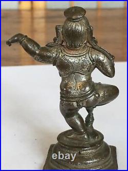 Rare, beautiful, early Indian silvered bronze Bale Krishna, 14 century